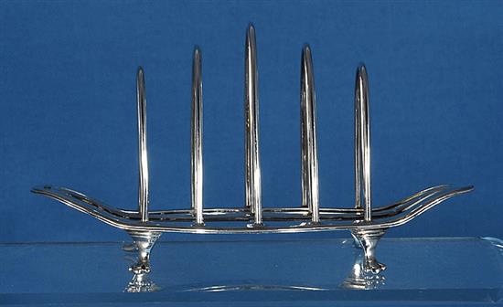 A pair of George V silver toast racks, by George Howson, Length 153mm weight 8.1oz/253grms